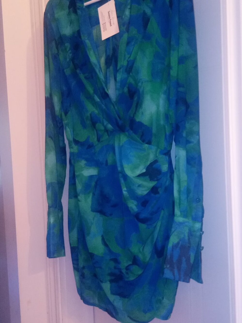 Sophisticated  mini cocktail dress. Elegant, glamourous. Luxxel size small.